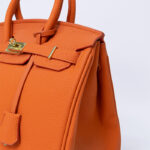 Hermes Kelly handbag in orange leather
